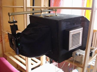 Illustration for article titled Projectors Made From Trash Deliver HD Video and Stereoscopic Movies